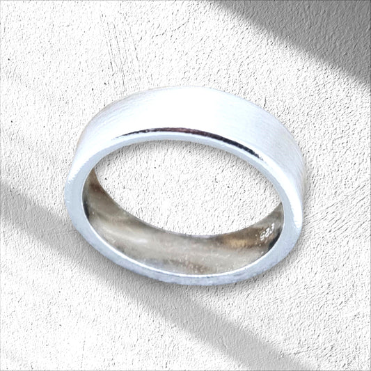 The distinctive brushed outer finish adds a touch of difference creating a subtle contrast against the smooth inner surface of this sterling silver ring