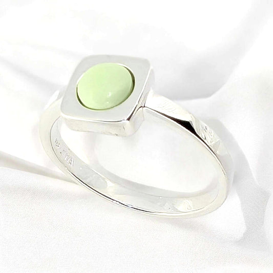 Chrysoprase - Nestled within the centre of the square ingot is a captivating chrysoprase gemstone contrasts vividly with the gleaming sterling silver