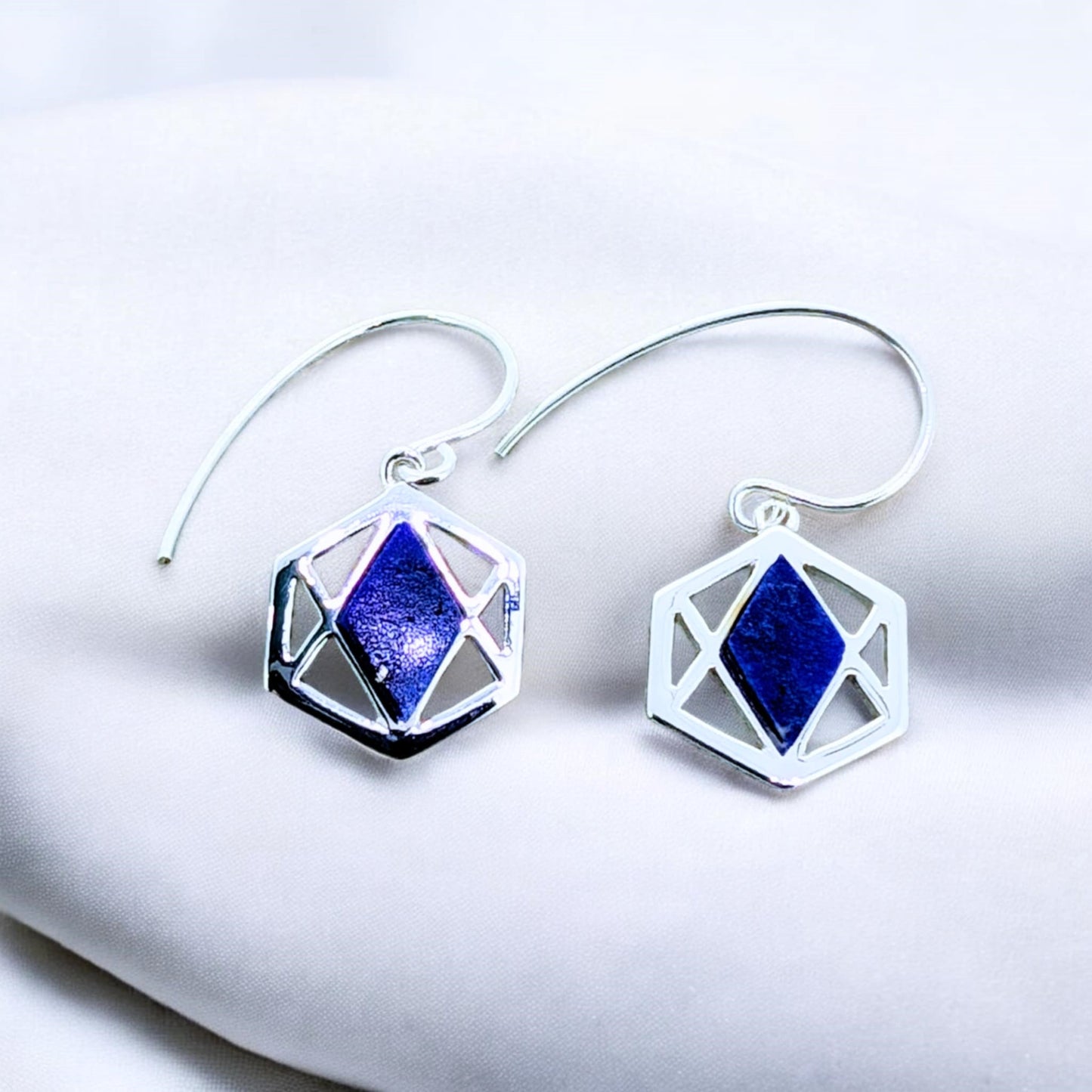 Lapis Lazuli - A striking diamond-shaped lapis lazuli gemstone set within a sleek six-sided sterling silver frame hook earrings